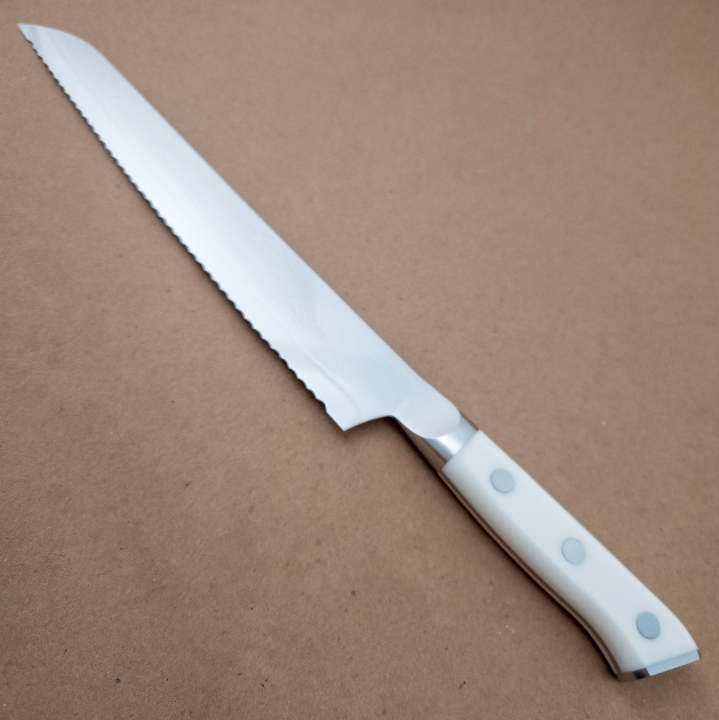 230mm MCUSTA ZANMAI Classic VG10 Damascus Bread Slicer Yo Handle - left side District Cutlery