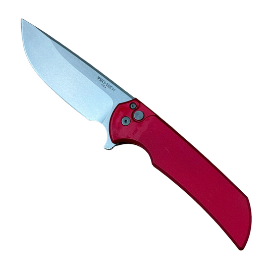 Red-handled knife with a silver blade on a white background