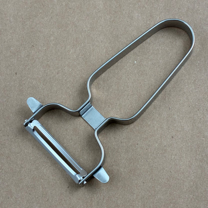 Curved stainless steel "Y"peeler