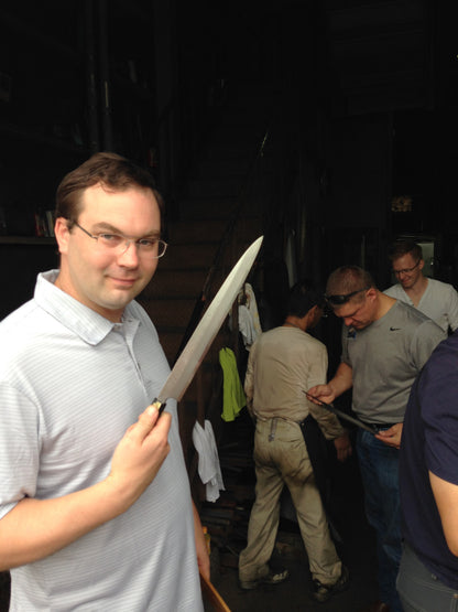 Ryan inspecting blades with Murray Carter