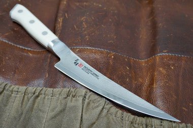 MCUSTA Zanmai Boning Knife - Damascus Clad with Corian - District Cutlery